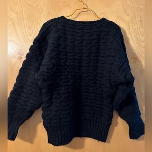 puffy black sweater